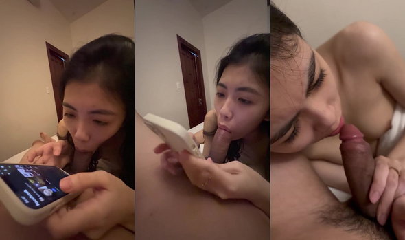 Miệng thì bú cu mà tay em vẫn chỉnh ảnh để đăng facebook